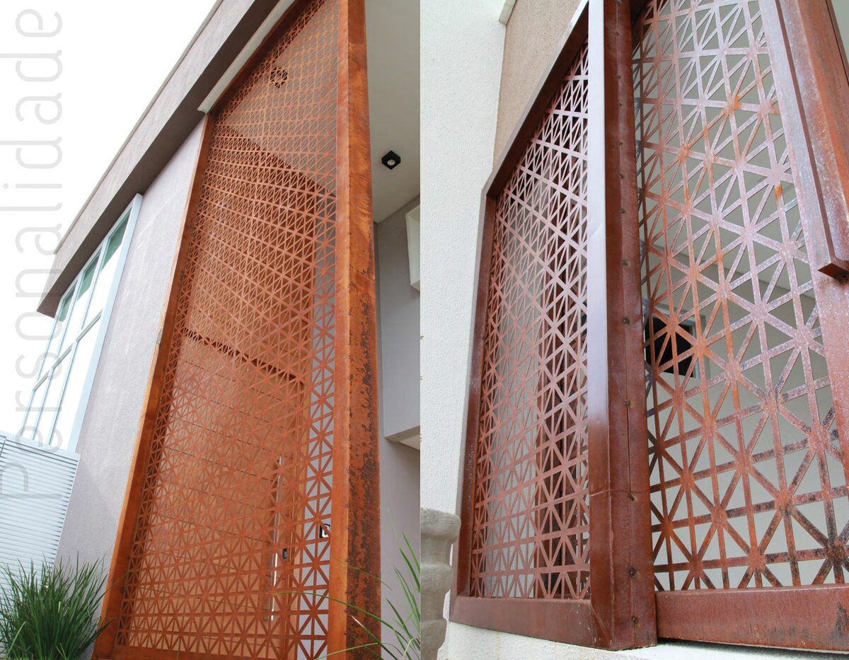 Paneles calados en ACM acabado corten con diseño geométrico